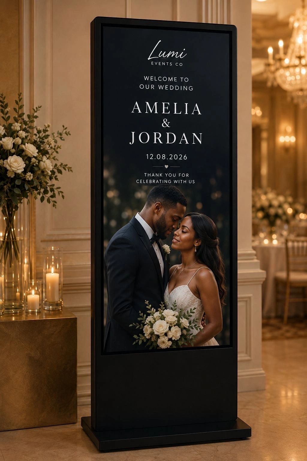 Lumi concept display with a personalised wedding welcome, beside flowers and candlelight